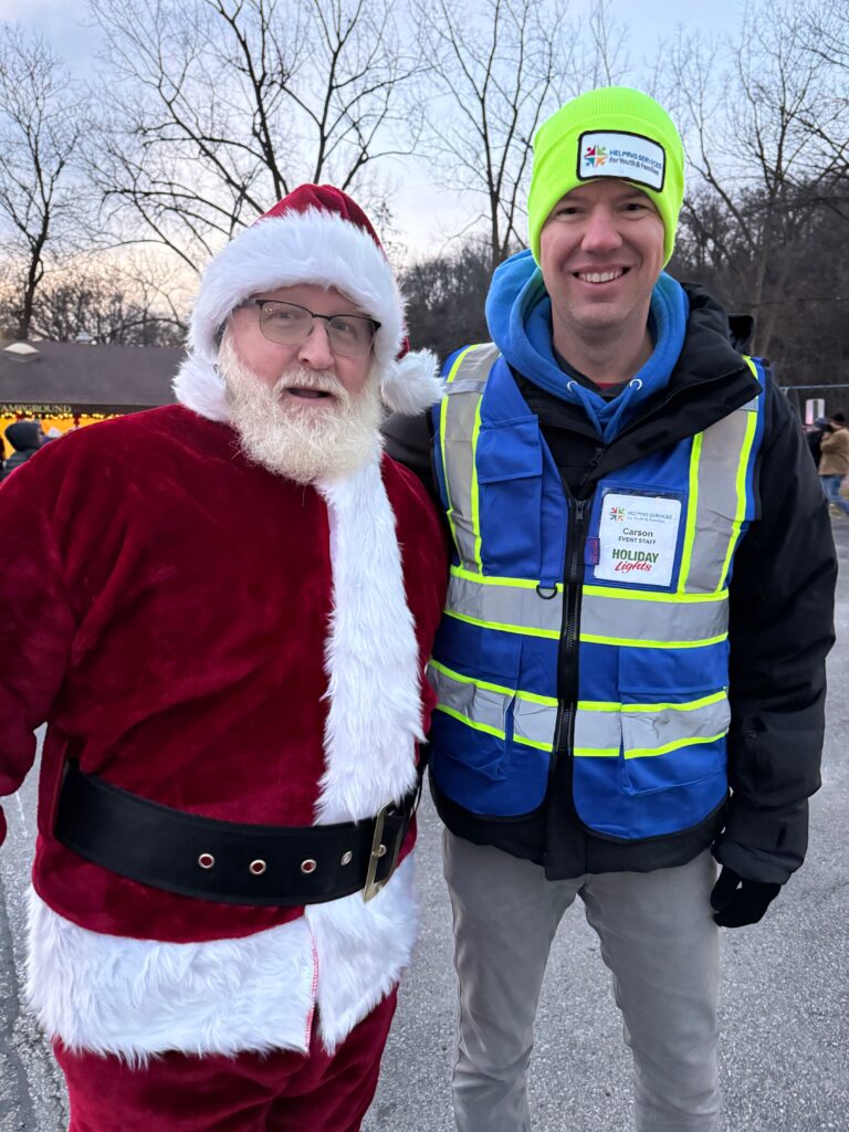 Santa with Helping Services director, Carson Eggland.