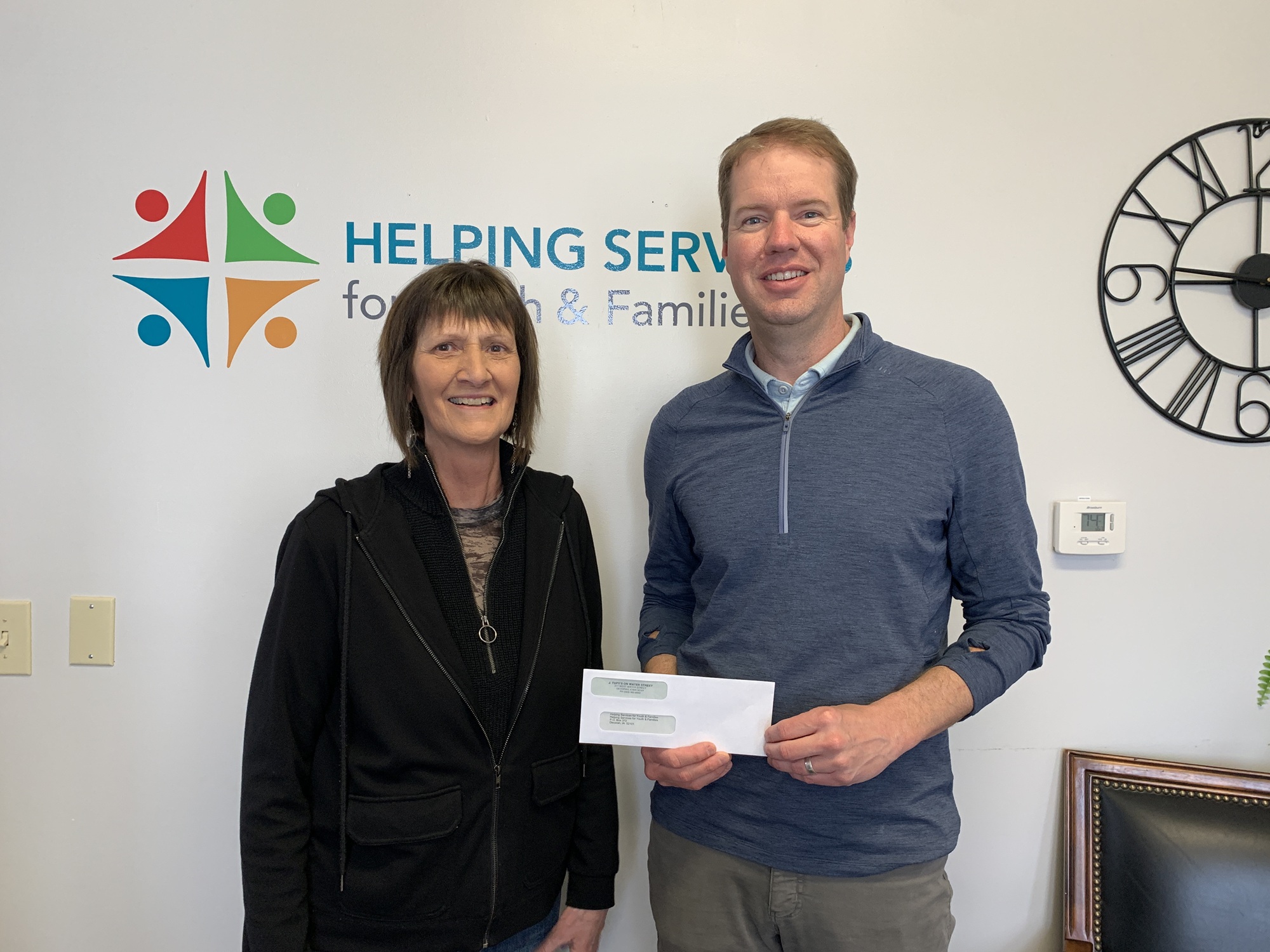 Joan Tupy donates share of sales from her clothing store to Helping Services.